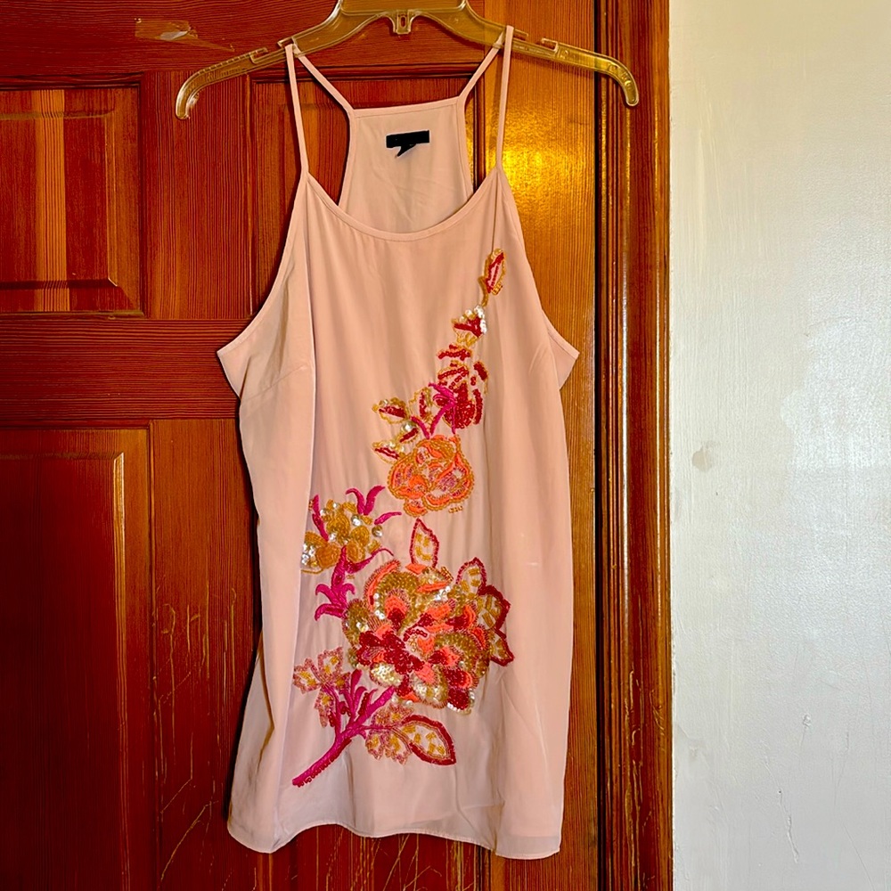 Embroidered tunic top.